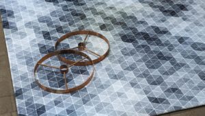 Alfombra geométrica kp en colores azules