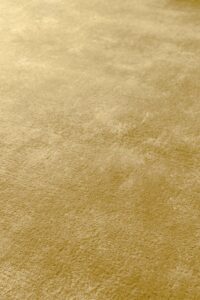 Detalle alfombra Ligne Pure Glow gold