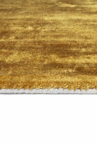 Detalle alfombra Ligne Pure Glow gold