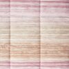 Detalle edredón Zucchi Idra algodón. Rayas delgadas y onduladas en tonos rosas y ocres anaranjados. Diseño pespunteado