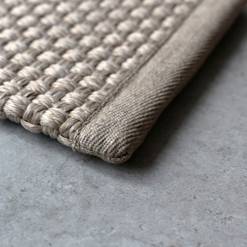 Remate Dobilux Terra para alfombra a medida Rols. Dobladillo y acabado rustic en lados paralelos dos a dos.