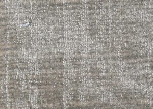 Alfombra a medida KP online, modelo Recikla, aspecto desgastado fibras recicladas. Fernández Textil. marrón