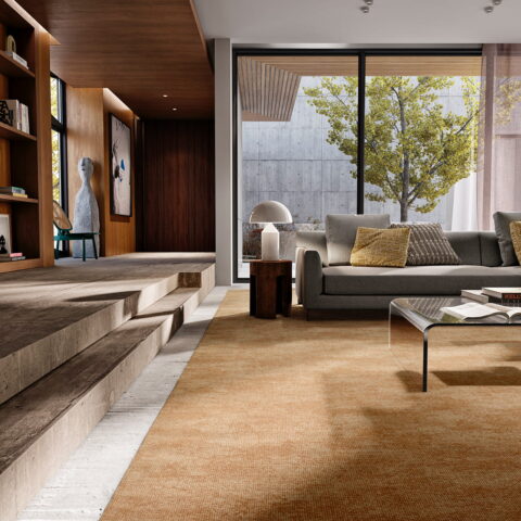 Tendencia alfombras Santos Monteiro 2023 modelo Reflex color teja salon acogedor moderno